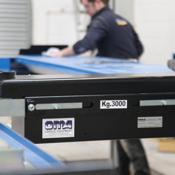 man working with mot equipment